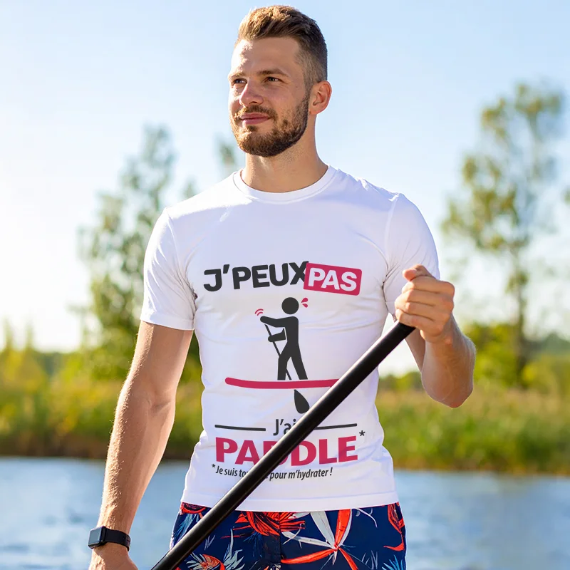 Idée originale 'Je peux pas, j’ai paddle' imprimée sur t-shirt pour homme sportif